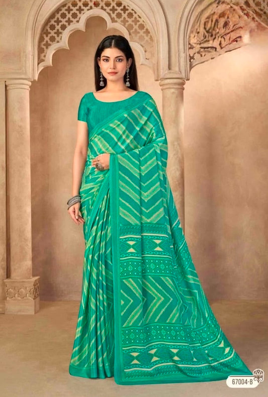 Sea-green crepe silk saree with striped weave and decorative border, draped look