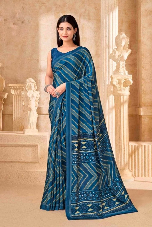 Dark teal blue crepe silk saree with striped pattern and geometric border drape