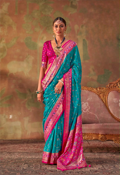 Teal and magenta patola silk saree with contrast border and pallu, ready to wear