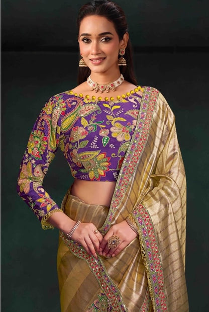Ready-to-wear saree with checked champagne drape and close-up of embroidered purple blouse
