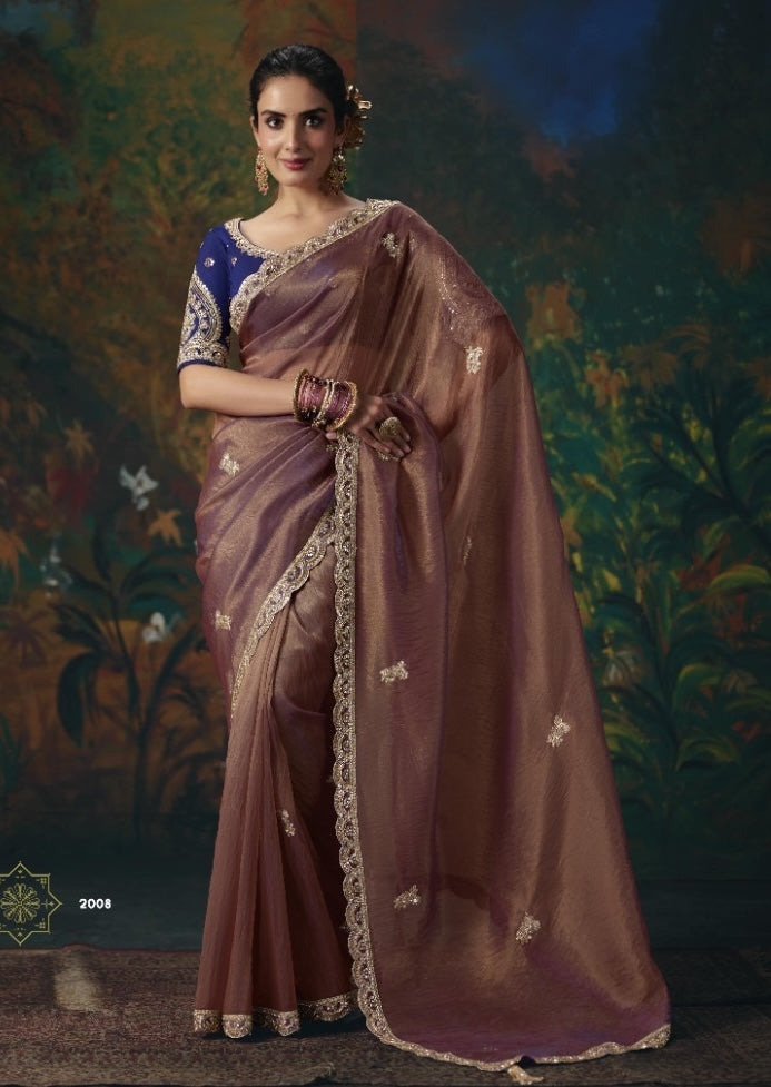 Brown tissue silk ready-to-wear saree with gold embroidered border and motifs, paired with blue blouse.