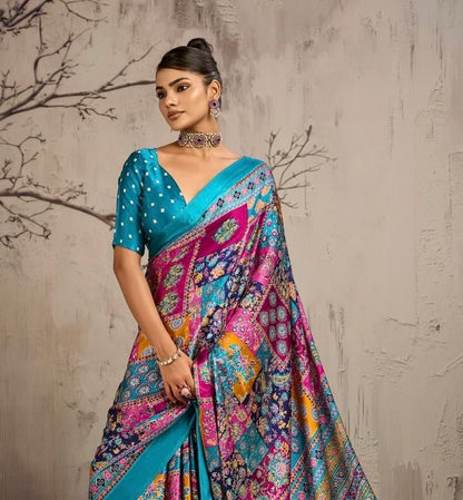 Blue modal silk ready-to-wear saree worn with a teal dotted blouse, featuring a multicolor print