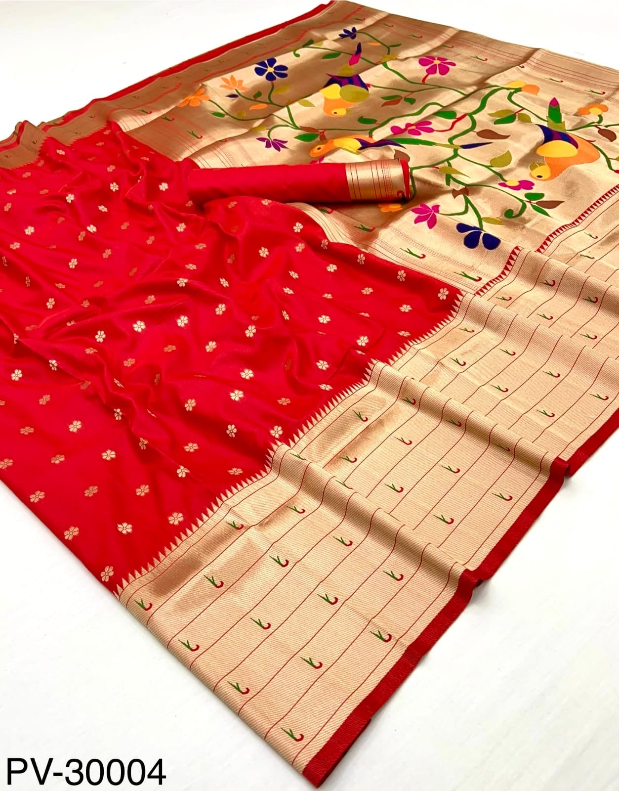 Folded saree: red body with beige pallu, multicolor floral vine motifs